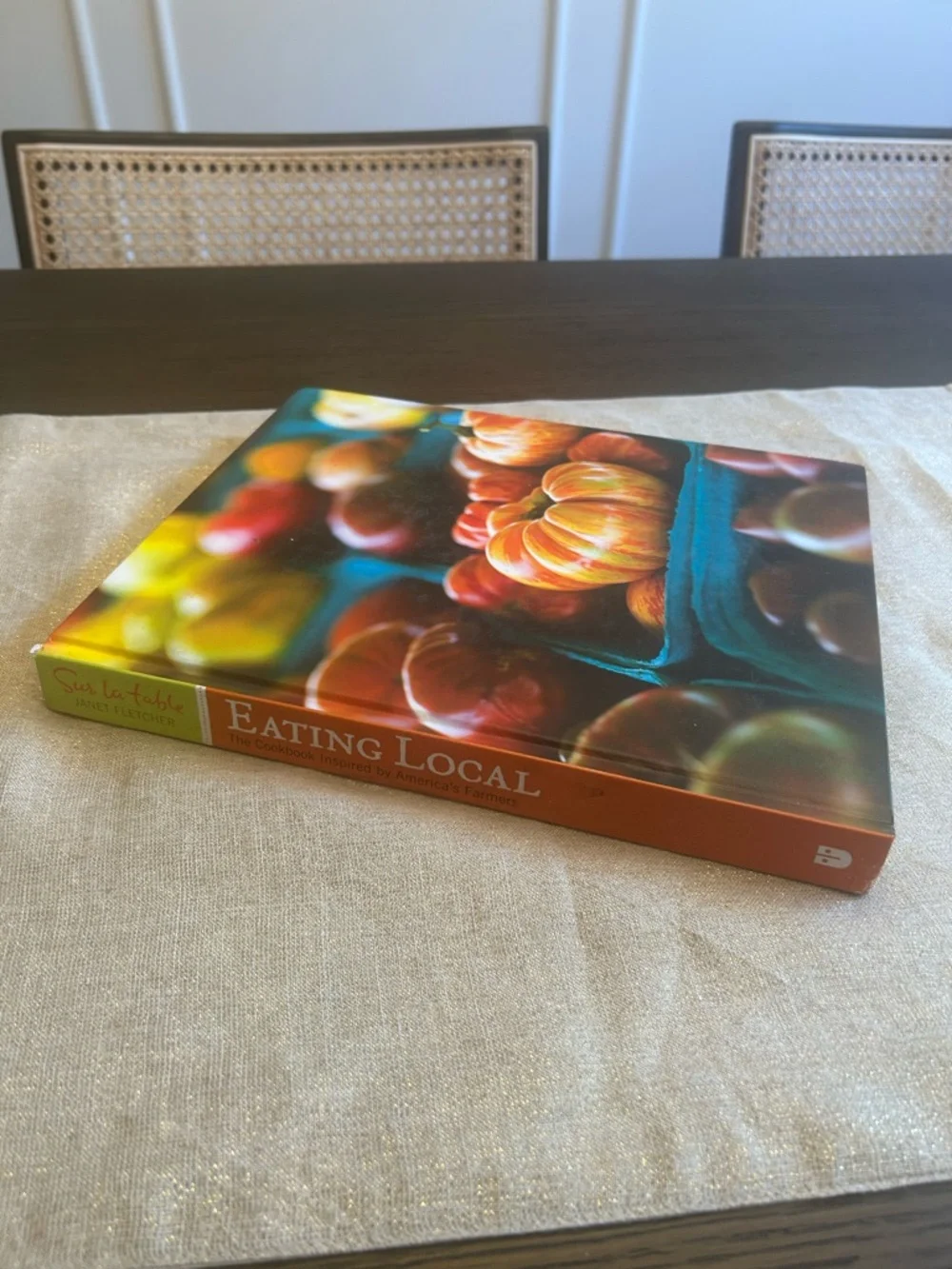 Sur La Table Eating Local Cookbook — Vibrant Orange, Green, Blue Cover